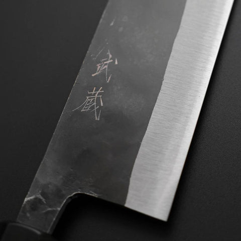 Gyuto Blue Steel #2 Kurouchi Büffelhorn und Magnolienholz Griff 210M